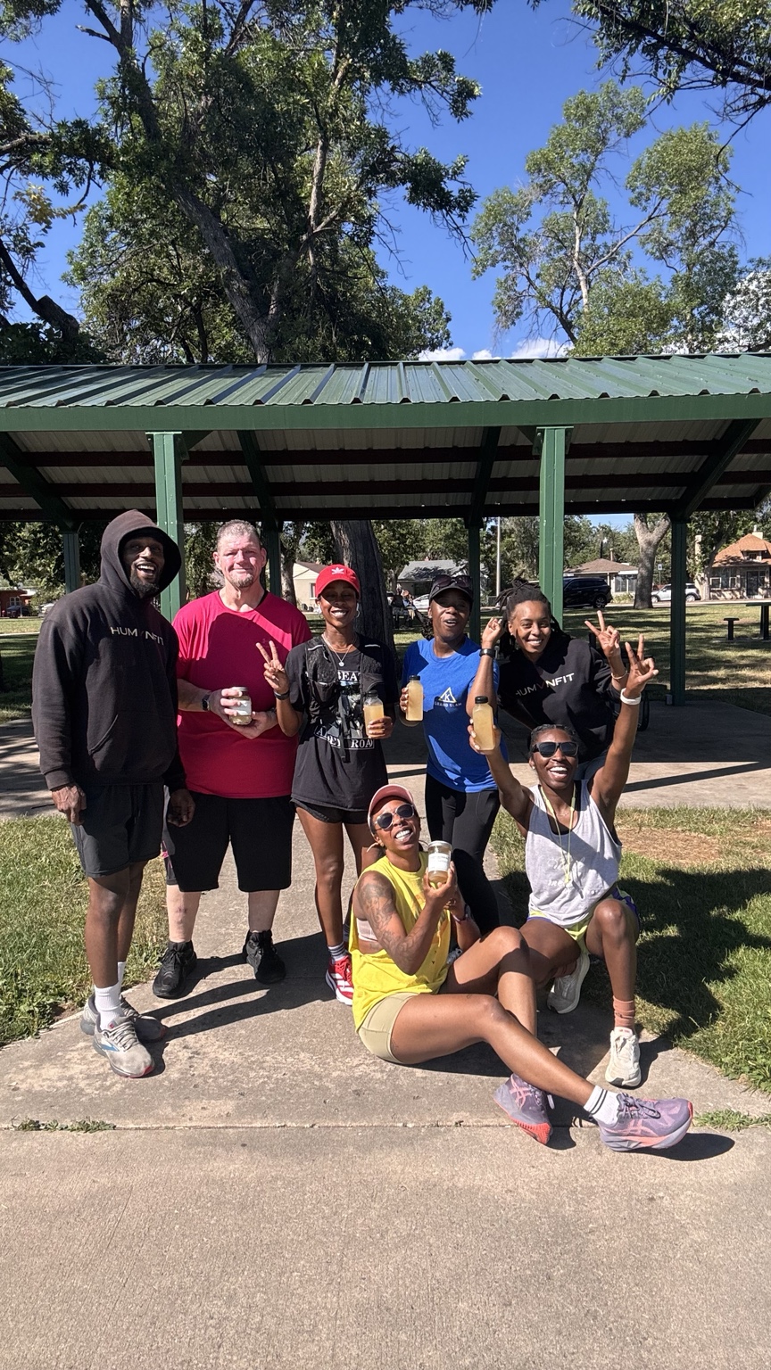 Run Club celebrating with sea moss lemonade after a run